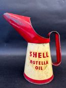 A Shell Rotella Oil quart measure.