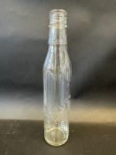 A Solvol pint glass oil bottle.