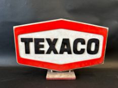 A Texaco double sided acrylic advertisement on wooden stand, 18 1/2 x 12 1/2".