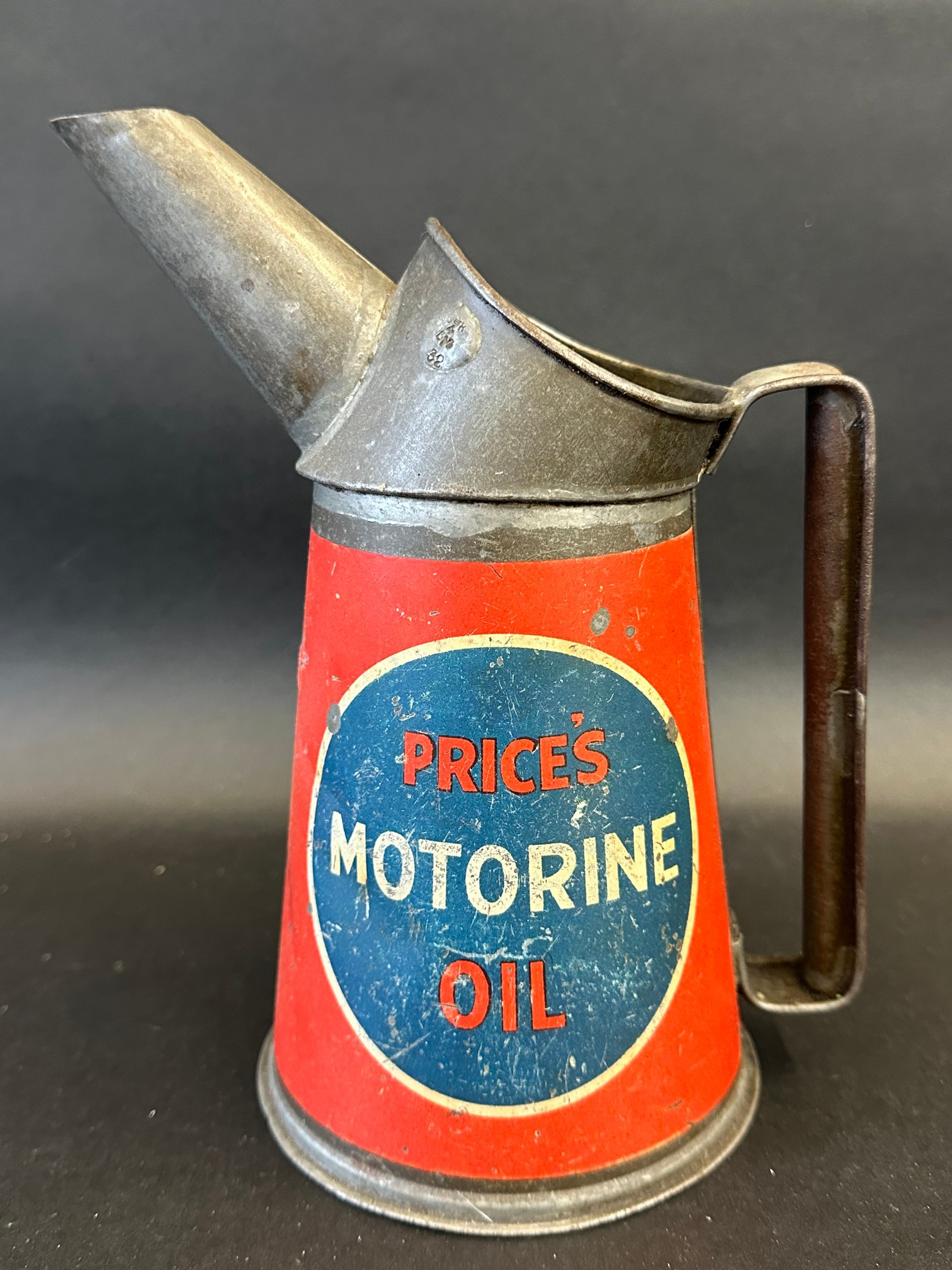 A Price's Motorine Oil quart measure, dated 1932.