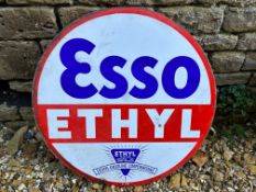 An Esso Ethyl circular double sided enamel sign dated 1935, 30" diameter.