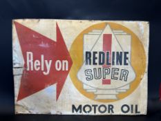A rare Redline pictorial tin advertising sign.