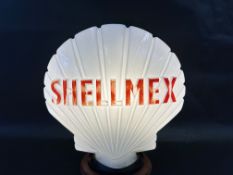 A Shellmex glass petrol pump globe by Hailware, chips to neck hidden by rubber ring.