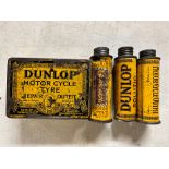 A small group of early Dunlop puncture repair tins.