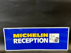 A Michelin Reception tin advertising sign, 25 x 9 1/2".
