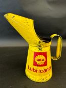 A Shell Lubricants quart measure.