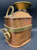 A Chekpump weights and measures copper and brass mounted half gallon measure from the County of