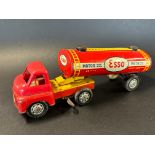 A Brimtoy tinplate and plastic model of an Esso delivery tanker.