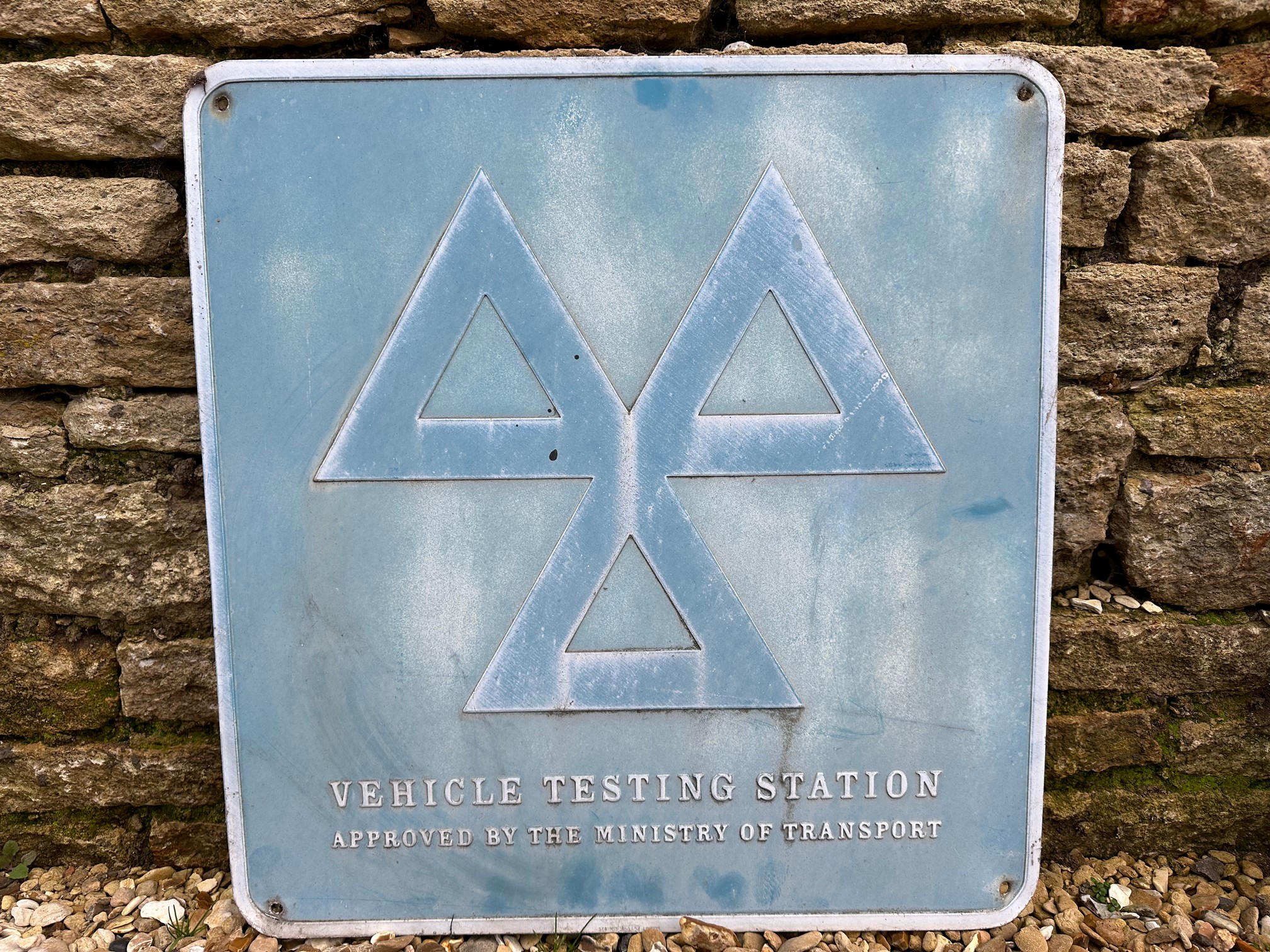 A Vehicle Testing Station advertising sign, 24 x 25".