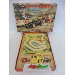 A boxed Bell Toys Duncan Hamilton at Oulton Park race game with Shell advertising.