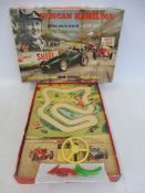 A boxed Bell Toys Duncan Hamilton at Oulton Park race game with Shell advertising.