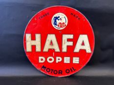 A French circular tin sign advertising Hafa Dopee Motor Oil, 20" diameter.