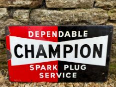 A Champion Dependable Spark Plug Service rectangular enamel sign, dated 1951, 23 x 13".