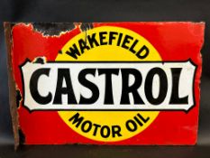 A Wakefield Castrol Motor Oil double sided enamel sign with hanging flange, by Bruton of London,