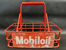 An eight division crate with Mobiloil sign to the front.