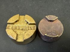 A Carburine brass petrol can cap and a plain inch cap.