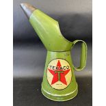 A Texaco quart measure in excellent condition, indistinctly dated, late 1930s.