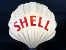 A Fat Shell glass petrol pump globe, damage to neck, dated February 1953.