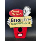 An Essolube Motor Oil bottle mounted die-cut showcard.