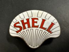 A Shell enamel cap badge by Gaunt.