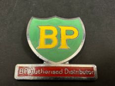 A BP Authorised Distributor chrome plated and enamel cap badge.