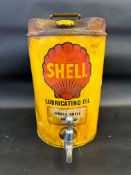 A Shell Lubricating Oil five gallon drum dispensing 'Single Shell SAE 20'.