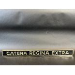 An unusual embossed shelf strip advertising 'Catena Regina Extra' (bike hubs for Italian bicycles).