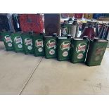 Eight Castrol pint oil cans.