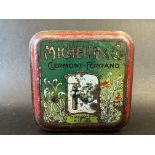 A rare and early Michelin tin, with brightly coloured designs to all sides.