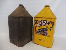 A Barge Oil five gallon can plus a second for Golden Film Lubricants.