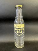 A Duckhams Motor Oil bottle.