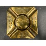 A Silvertown Oils brass ashtray.