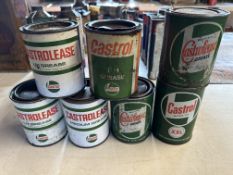 Five Castrolease grease tins and a later Castrol tin, plus a Castrol Motor Oil XXL.