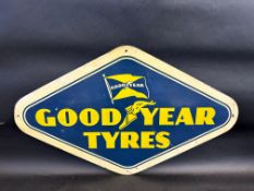 A Goodyear Tyres hardboard lozenge shaped advertising sign, 29 1/2 x 18".