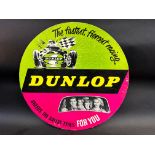 A Dunlop circular pictorial showcard with an image of a circa 1960s Formula 1 racing car, 16"