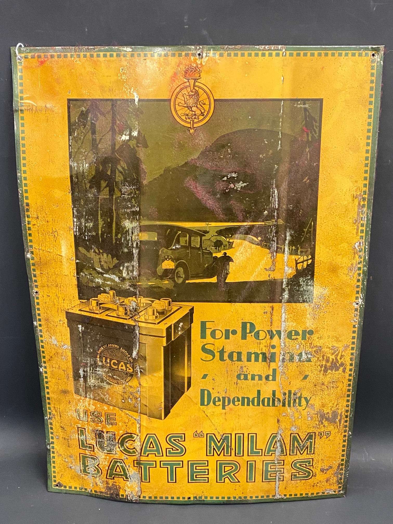 A Lucas Batteries pictorial tin advertising sign promoting Milam Batteries, 19 x 27".