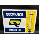 A Duckhams Motor Oil enamel thermometer by Burnham of London, in excellent condition, 26 x 20".