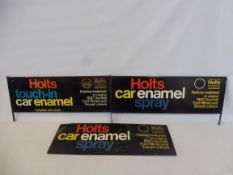 Two Holts car enamel pediment advertising signs, each 29 1/4 x 13" (including brackets).