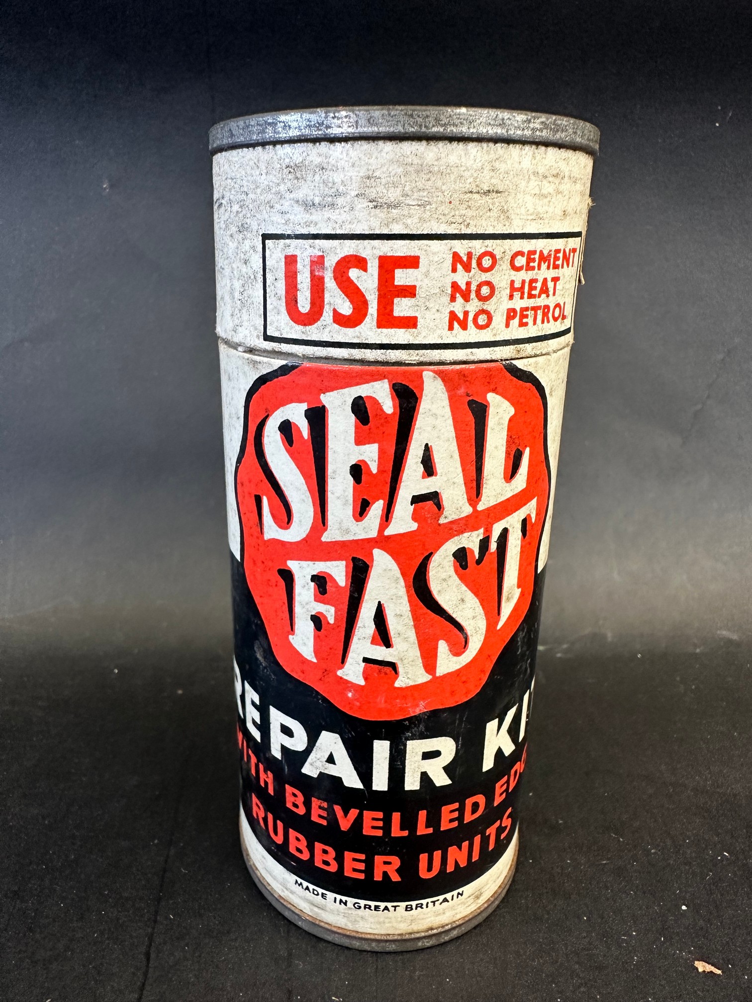 A Seal Fast Repair Kit in cylindrical cardboard canister.