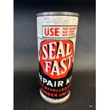 A Seal Fast Repair Kit in cylindrical cardboard canister.