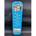 A rectangular tin thermometer advertising Fulmen batteries, 7 1/2 x 27".