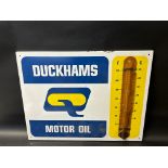 A Duckhams Motor Oil enamel thermometer by Burnham, 26 x 20".