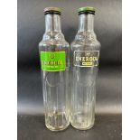 Two variations of BP Energol quart glass bottles.