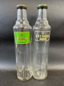 Two variations of BP Energol quart glass bottles.