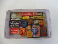 A tray of small motoring tins and accessories.
