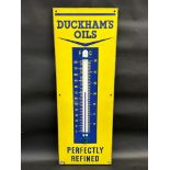 A Duckham's Oils 'Perfectly Refined' enamel thermometer in excellent condition, 13 x 36".