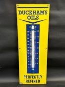 A Duckham's Oils 'Perfectly Refined' enamel thermometer in excellent condition, 13 x 36".