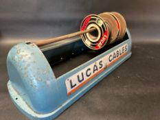A Lucas Cables dispenser for holding several reels of cable.