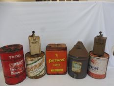 A selection of assorted five gallon cans and various others.