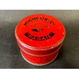 A Michelin vulcanising patches tin, with image of Mr Bibendum to the lid.
